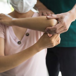 woman-with-shoulder-pain-goes-to-the-doctor-conce-2023-11-27-05-15-05-utc